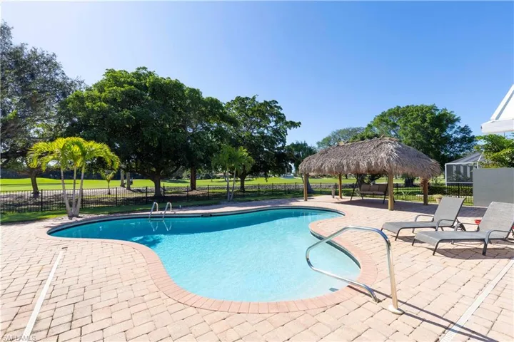 View of pool with a patio, a gazebo, fence, and a fenced in pool