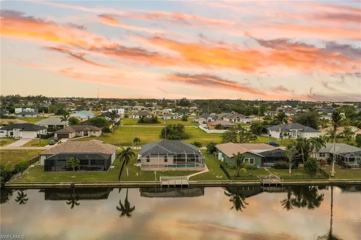 Aerial view at dusk with a water view