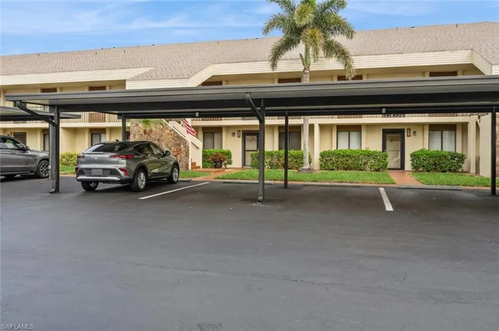 View of car parking with a carport