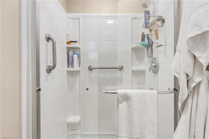 Bathroom featuring walk in shower
