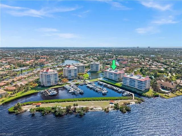Birds eye view of property featuring a water view