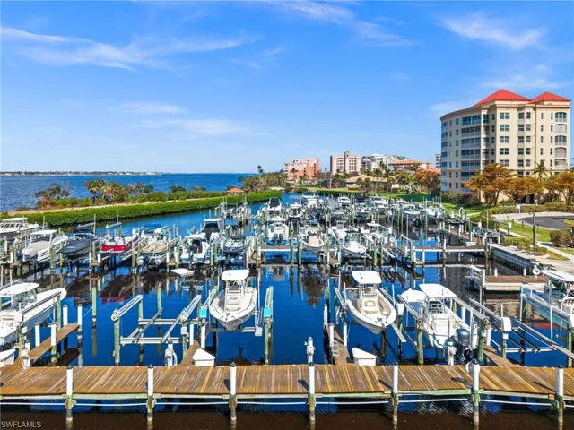View from your living room over the marina and river all the way down to Downtown Fort Myers!