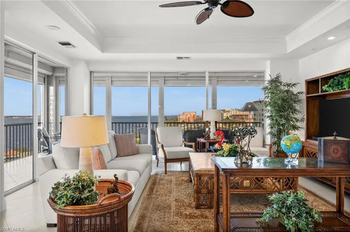 This Living Room boasts the most amazing water views all around!  Beautifully tiled and classy elegant furniture awaits you to explore the most magnificent views!