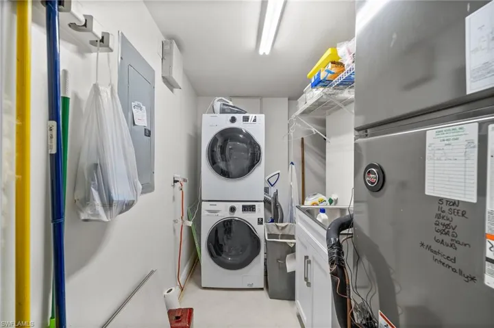 Utility Room with NEW AC, Water heater and newer stacked washer / dryer. All in perfect shape!