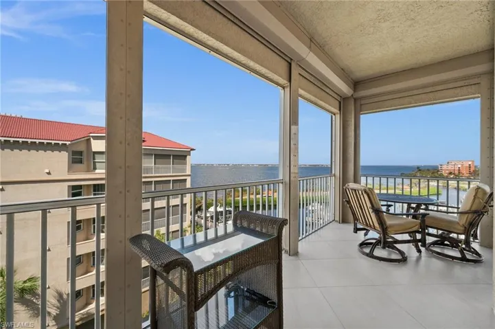 Side view from the screened lanai - overlooking the beautiful water, boats, and peacefulness!