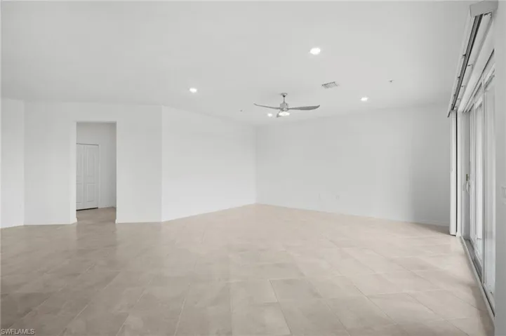 Spare room with recessed lighting and ceiling fan