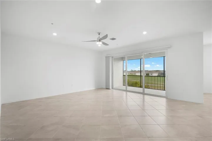 Empty room featuring recessed lighting and ceiling fan