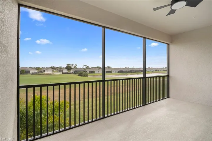 Unfurnished sunroom featuring a residential view