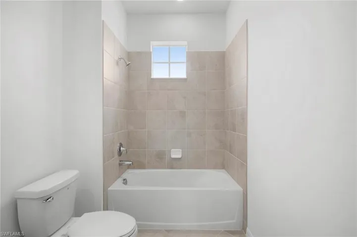 Full bath with  shower combination and toilet