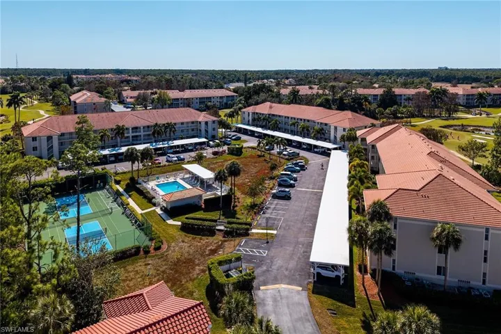 Aerial view of apartment complex and a pool