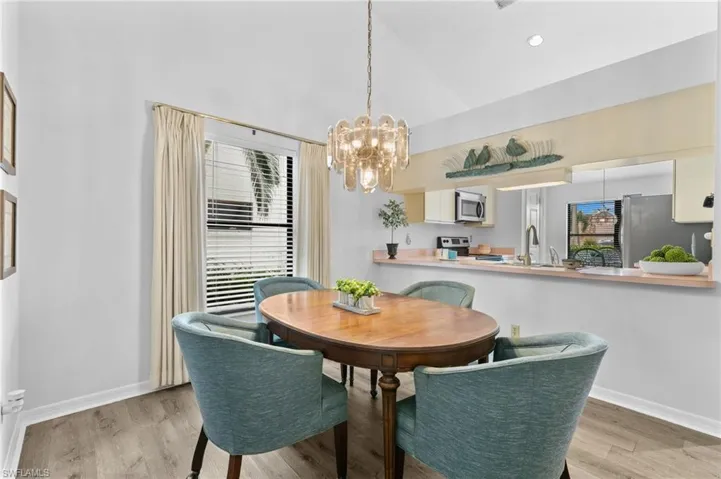 Lovely Dining area, convenient to the kitchen.  Table has extra leaf for additional expansion.