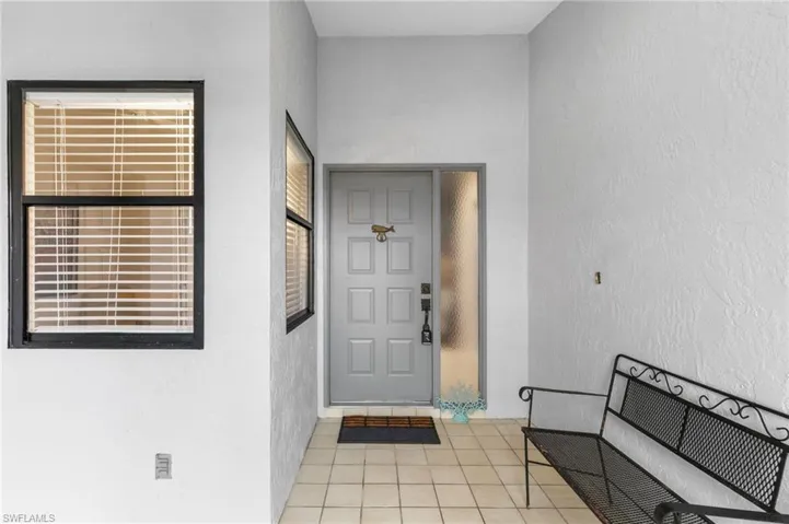 Screened Entry area also leads to 2 car Garage