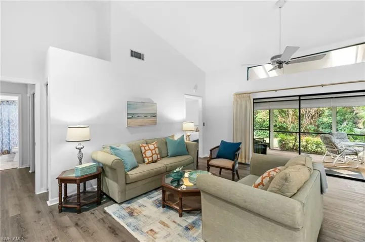 Light and Bright with Glass Wall of sliders open to the Interior!