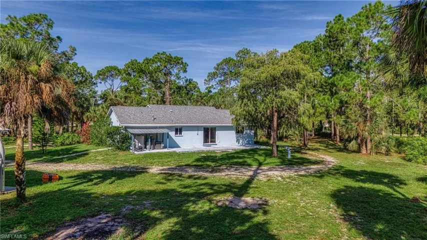View of front of house with a front yard