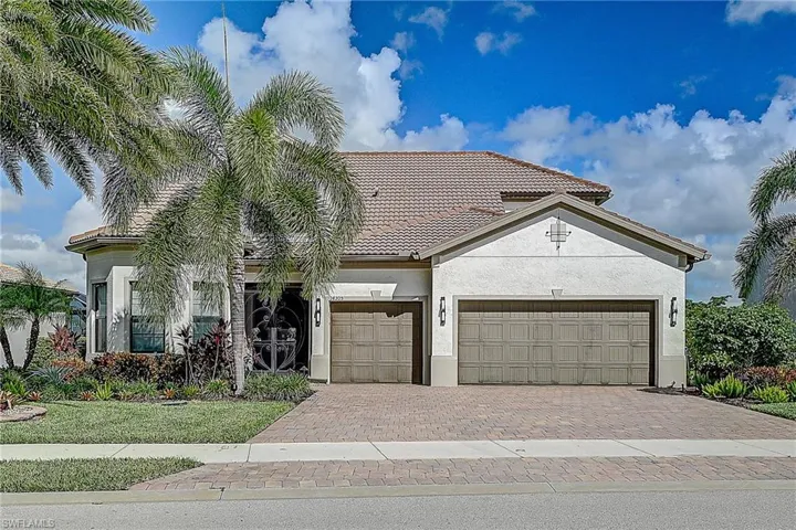 Mediterranean / spanish house with a garage