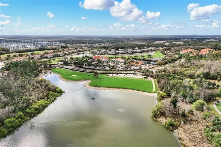 Bird's eye view of a large body of water and a local golf course