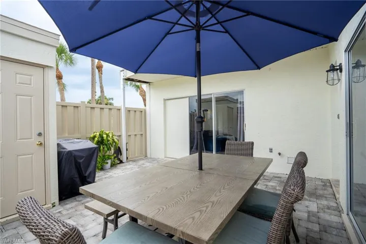 View of patio featuring area for grilling