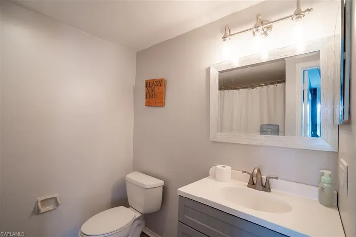 Bathroom featuring toilet and vanity