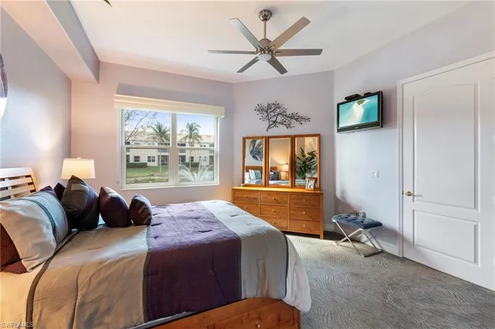 Bedroom with carpet floors and ceiling fan