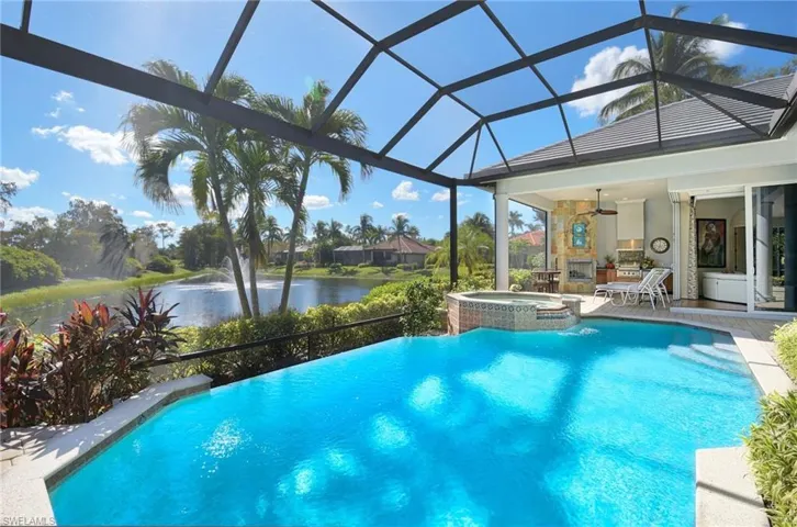 Infinity edge salt water pool with new salt cell, outdoor kitchen and fireplace. SOUTHERN exposure