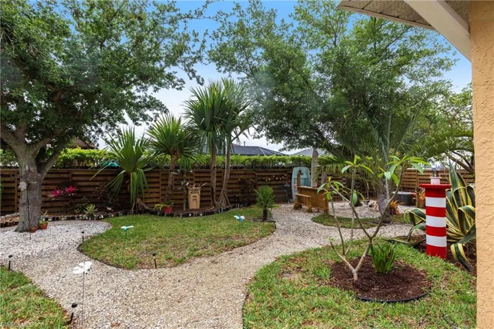 View of yard featuring fence