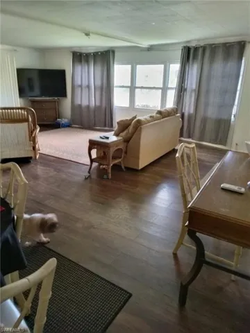 Living room with wood finished floors