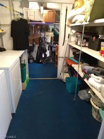 Storage room with washer and dryer