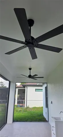View of patio / terrace with a ceiling fan
