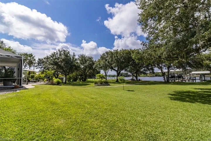 Backyard playground. Boat docks, River, Firepit
