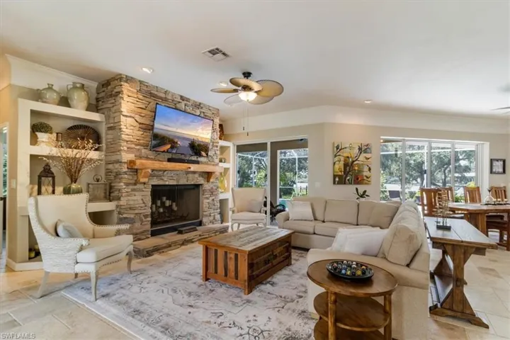 Light and Bright living room overlooking the pool and River
