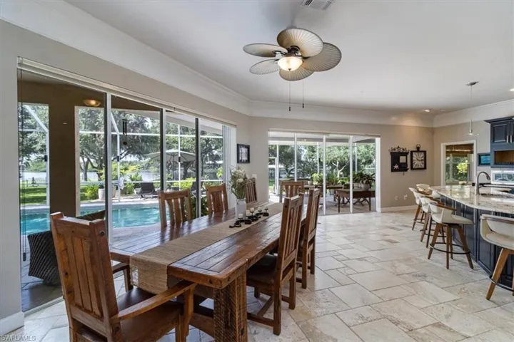 Overlook the pool and the River while your family enjoys dinner