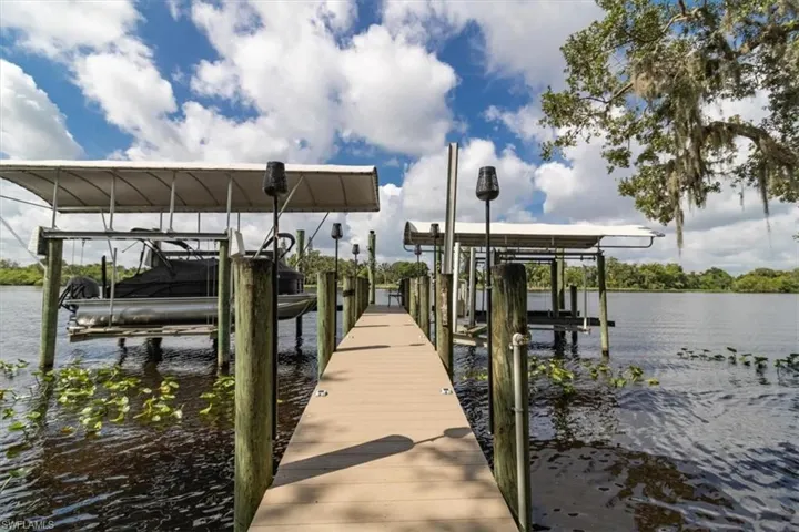 2 covered boat lifts and one jet ski lift