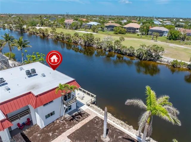 Bird's eye view with a water view and a residential view