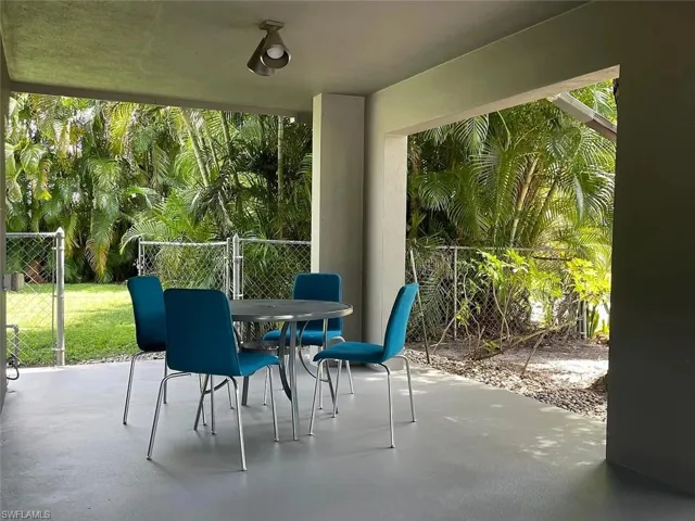 View of patio featuring outdoor dining area
