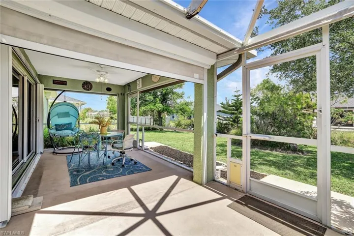 Screened in Patio w/Rolldown Sun Shades