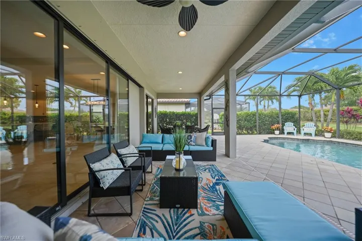 One of the greatest features of the Augustino Floor Plan is the large under truss lanai spanning the entire length of this home. There are 6 sliding doors opening up to this outdoor space that provides access to your gorgous heated salt water pool and outdoor living area.