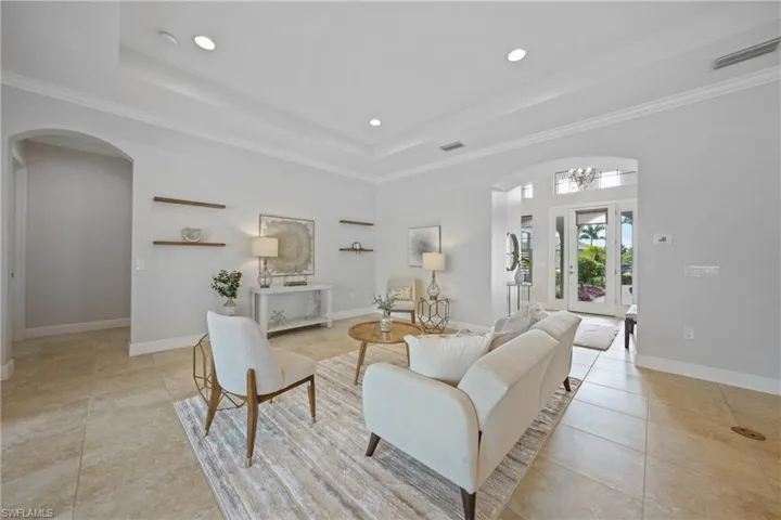 Fresh Paint, Crown Molding, Plantation shutters, oversized tile, and custom lighting are just some of the nice features of this welcoming space