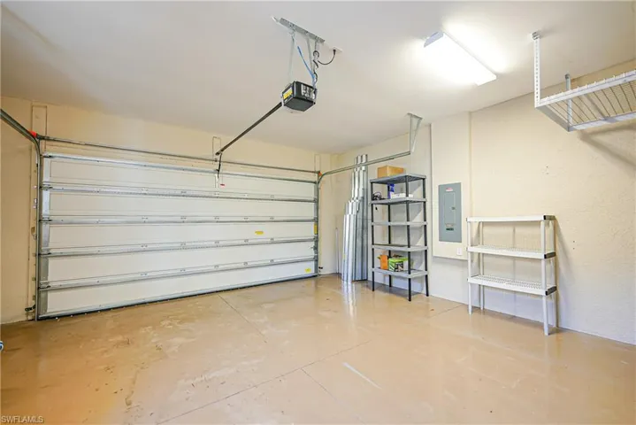 Spacoius Three Car Garage with extra storage and extra utility sink.