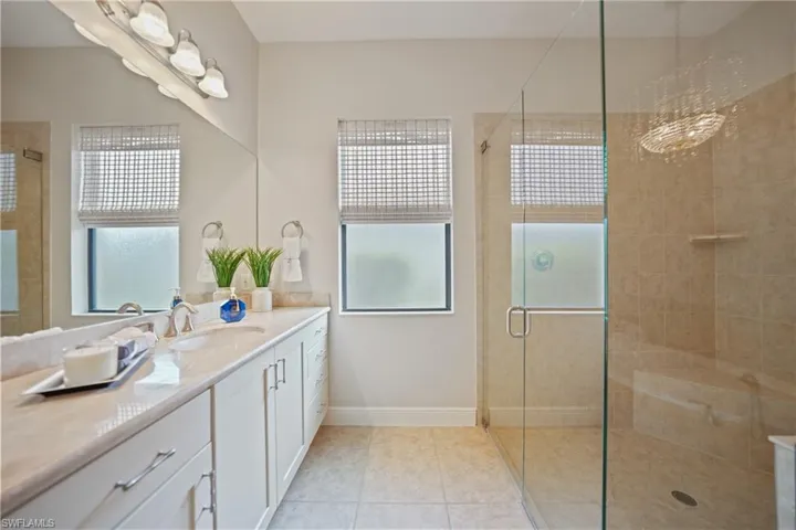 Primary Bath offers his and hers sinks, walk in shower and a relaxing roman soaking tub.