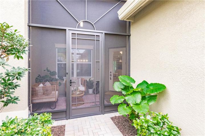 The owners of this beauty enclosed the front entrance to expand the space for additional relaxation space.  Have a pet?  They will love sitting out here for hours on end....so will you!