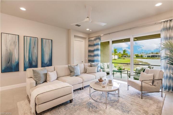 This vista of the great room will make you want to see what else this Nantucket stunner has to offer.  Come with me on this journey to see everything this 2bed/2bath villa has to offer.  You won't be disappointed!