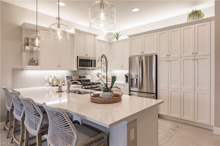 While preparing that special meal you have yearned to share with others you will be joined by them at the oversized peninsula.  It also is a great place to take your morning cup of "joe".  While thinking about that tasty special recipe, be sure to check out the tasteful lighting upgrades throughout the kitchen and the rest of the home.