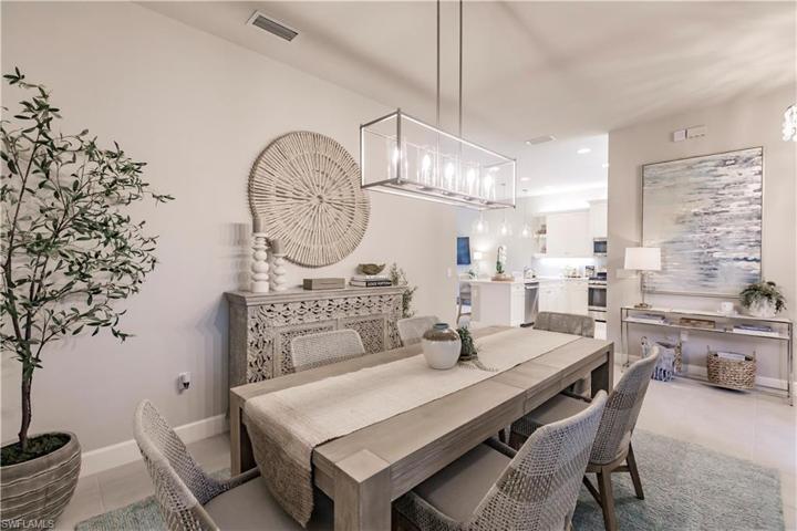 The dining area is conveniently located adjacent to the kitchen.  The builder has thought of everything in this well appointed space....not to mention convenience!