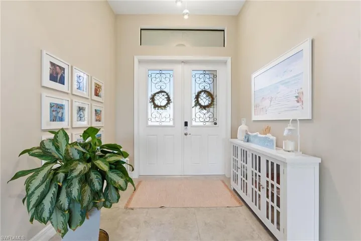 Foyer entrance featuring french doors