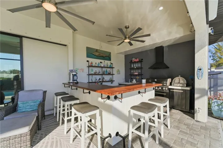 View of patio / terrace with ceiling fan