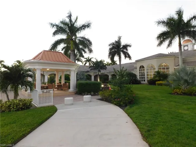 View of community with green space a gazebo