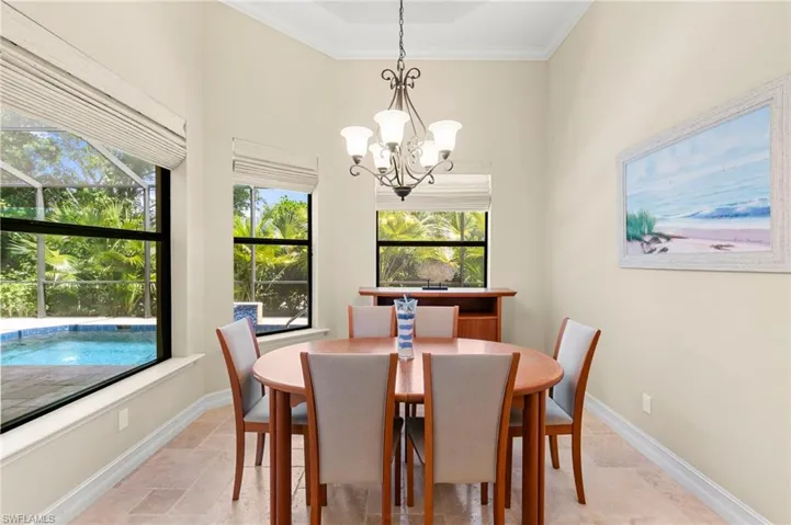 Separate dining area with lovely pleated blinds