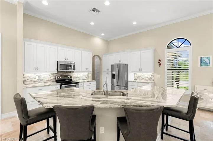 Large kitchen island with counter seating