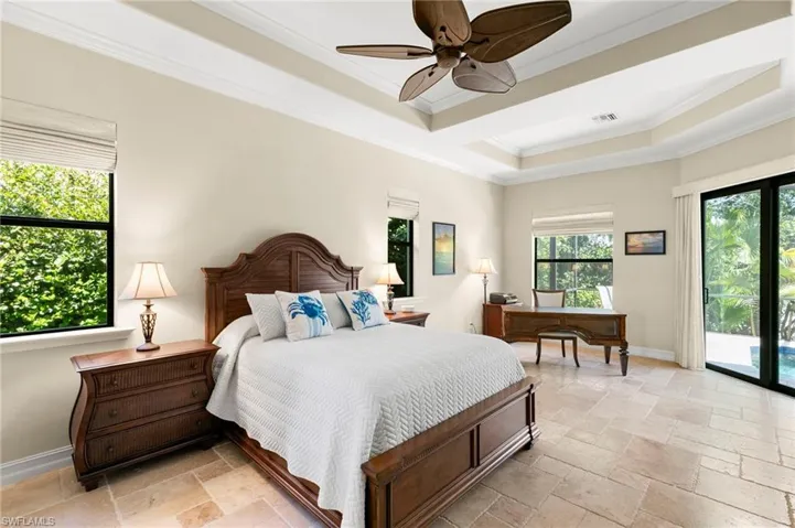 Spacious primary bedroom with lanai access