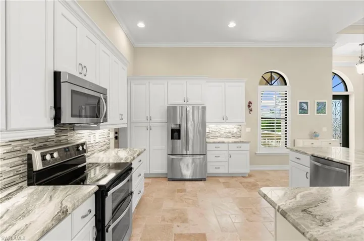 White plantation shutters in kitchen